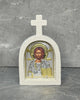 White stone cross icon with Christ Pantocrator icon of Jesus