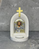 White stone Orthodox candle altar with Christ Pantocrator icon of Jesus