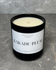 Kakadu Plum soy wax candle in a dark glass jar