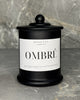 Ombre soy wax candle in a black glass jar with domed lid