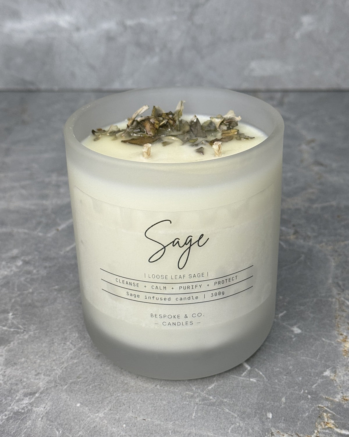 Sage soy wax candle in a pale glass jar