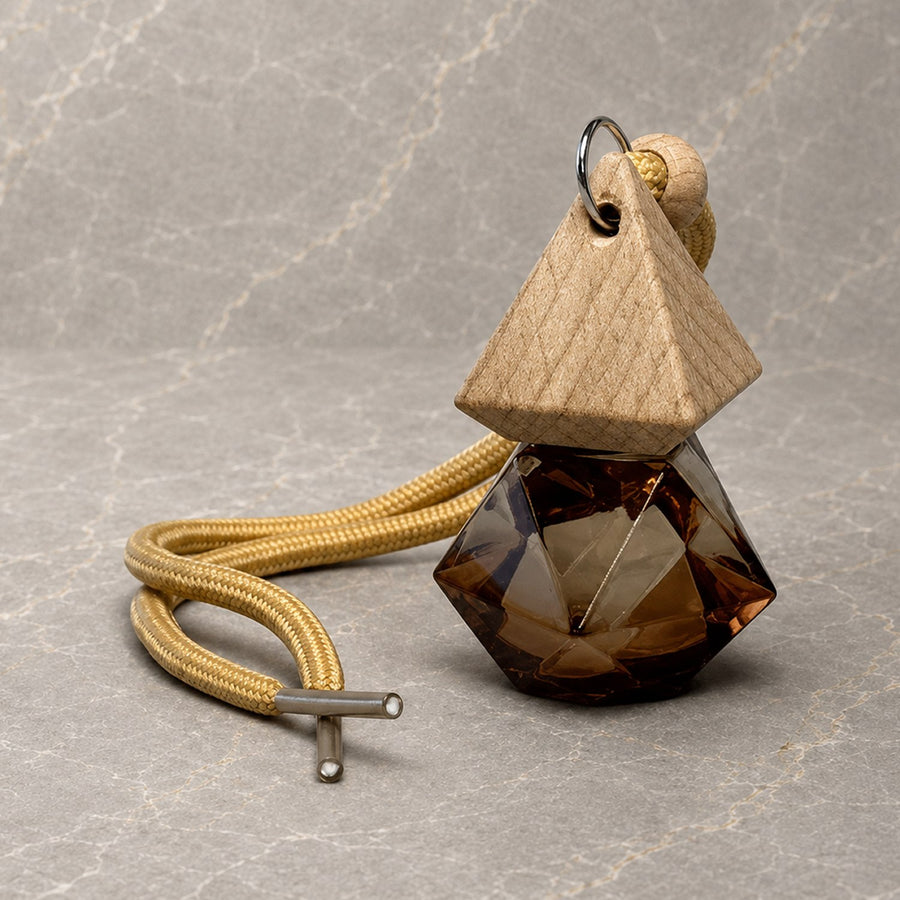 Car diffuser in faceted amber glass